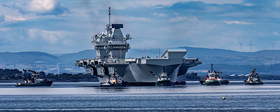 Tugs with HMS Queen Elizabeth.