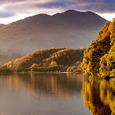 Trossachs The Trossachs generally refers to an area of wooded glens, braes, and lochs lying to the east of Ben Lomond in the...